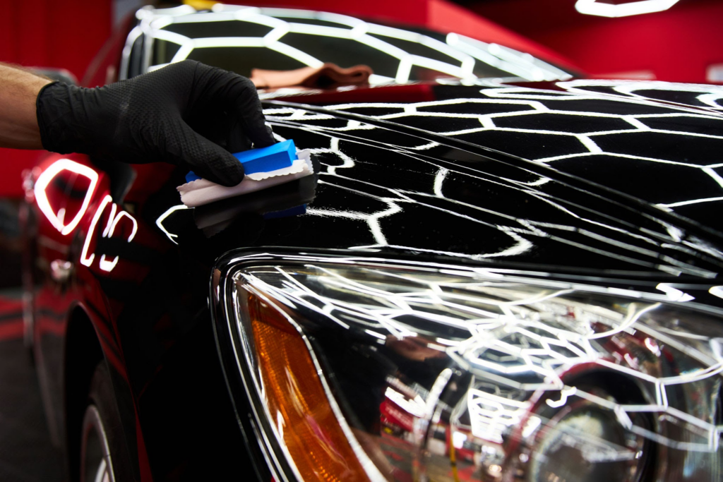 Sealing the freshly decontaminated clear coat.