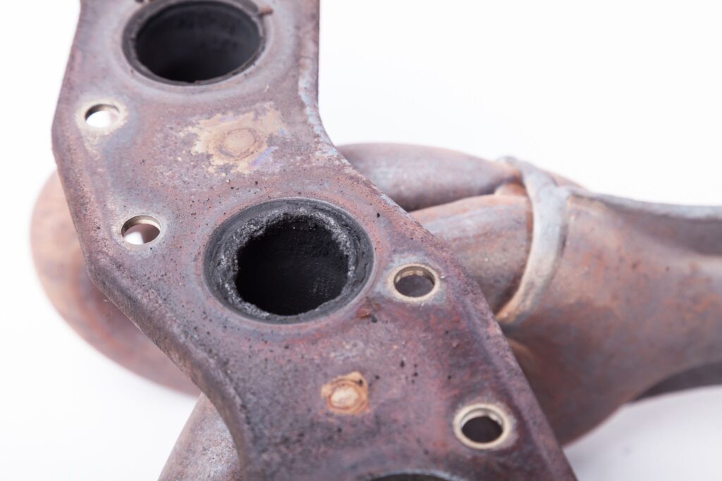 Thermal stress causes exhaust manifolds to warp and leak gases